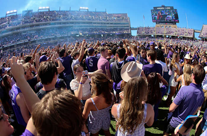 Fans storm the field at TCU.